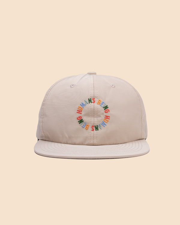 Creme <br> Nylon Hat <br> Humans Being