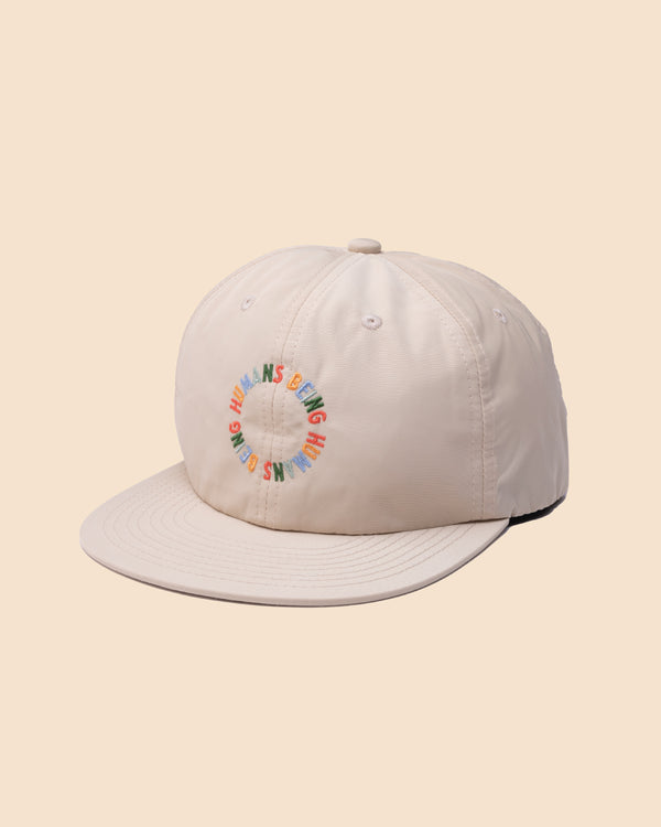 Creme <br> Nylon Hat <br> Humans Being